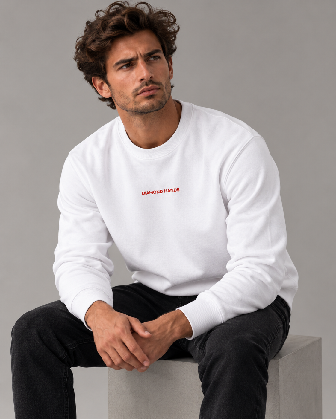 Diamond Hands sweatshirt in white with red embroidery, premium studio portrait on a neutral grey background