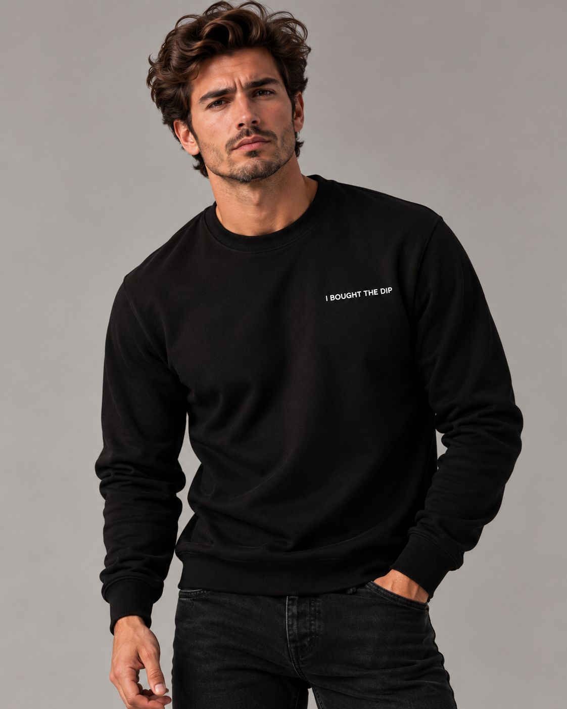 Male studio portrait wearing the Black I Bought The Dip sweatshirt with white embroidery